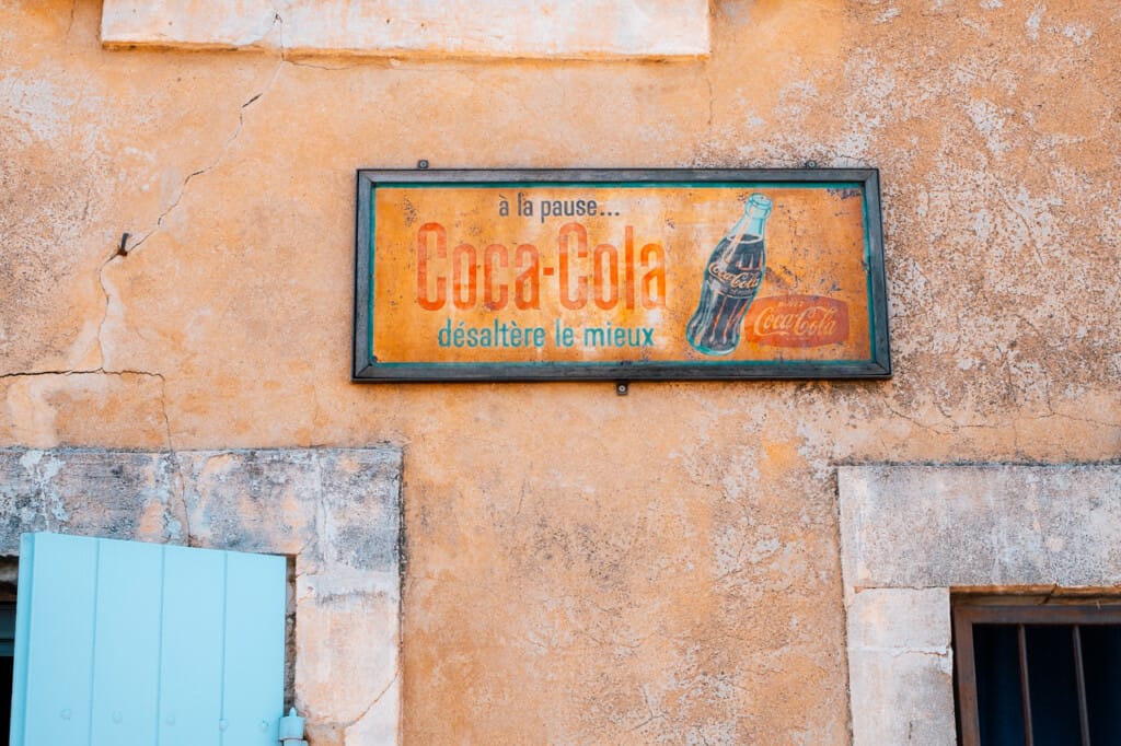 Weathered Coca Cola Advertising Sign