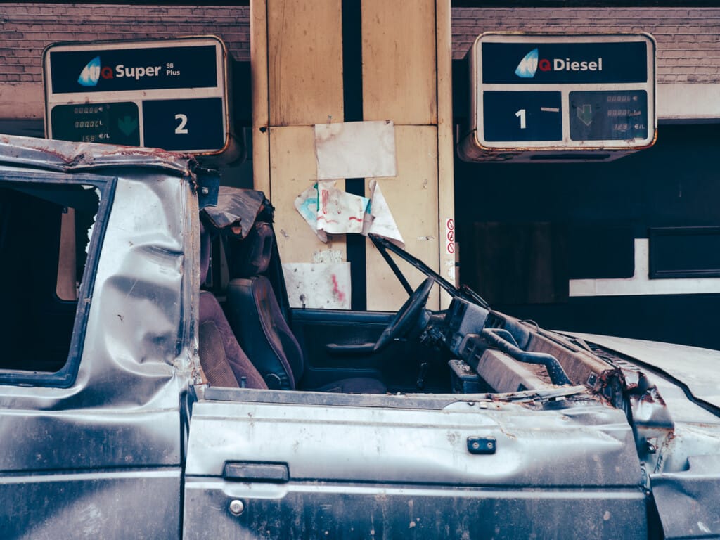 Crashed Car At Gas Pump